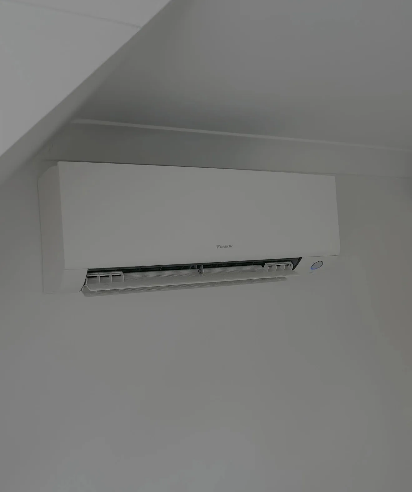 Outdoor AC condenser unit on a property exterior